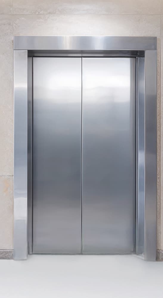 Plain Stainless Steel Door in minimalist brushed steel